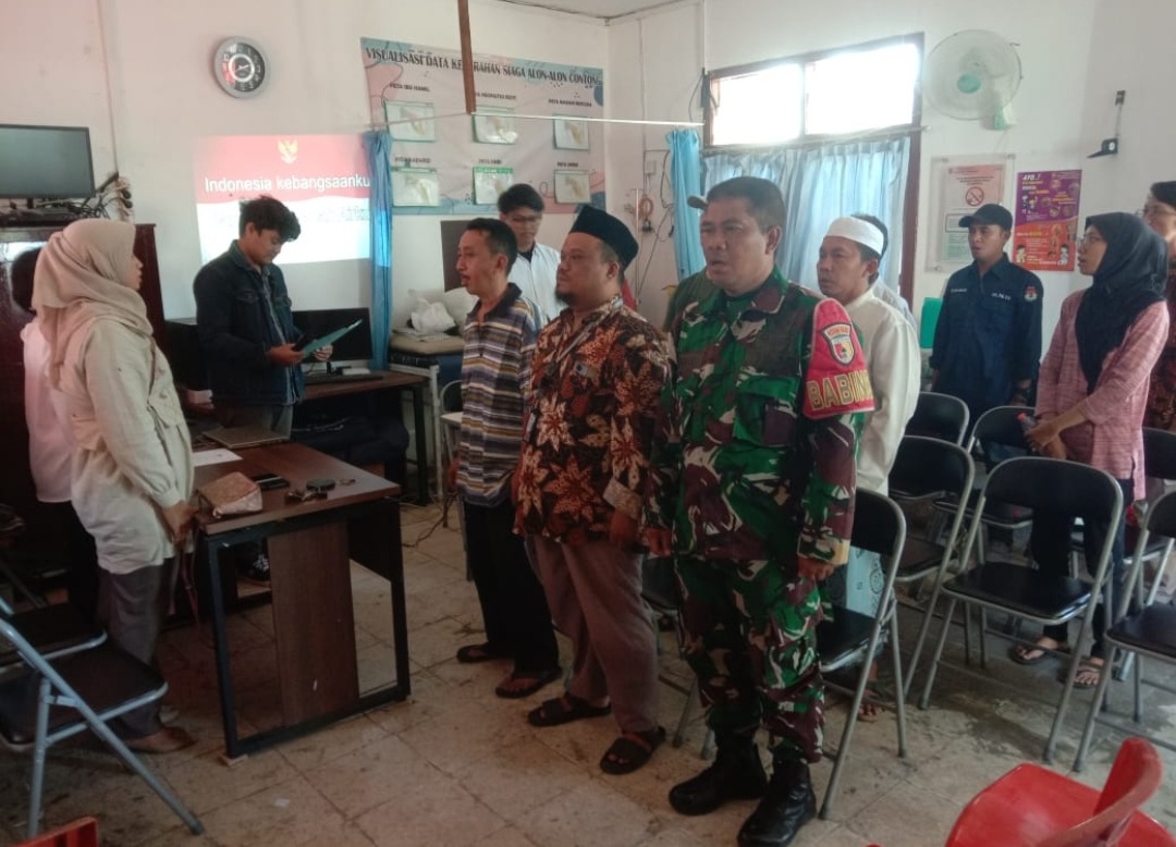 Foto : Babinsa hadiri rapat pleno terbuka Rekapitulasi Daftar Pemilih Sementara Hasil Perbaikan (DPSHP) tingkat Kelurahan