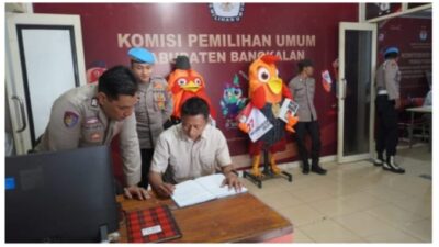 Foto : Tahap Kampanye Pilkada 2024, Polres Bangkalan Tingkatkan Patroli dan Penjagaan Kantor KPU dan Bawaslu